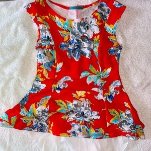 Floral Peplum Top with sheer train in back. High low fit.